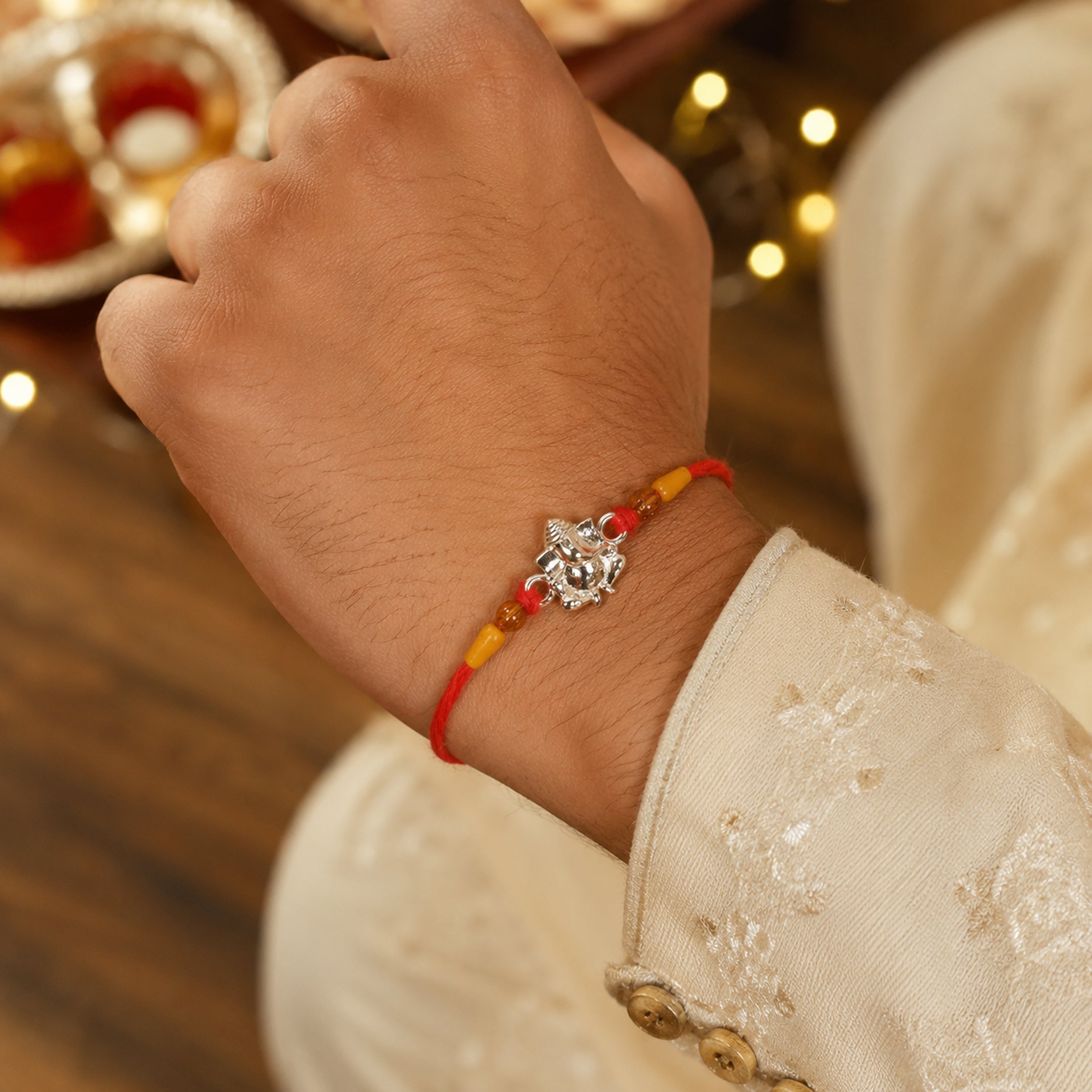 Twinklitz Elegant Ganesha Sterling Silver Rakhi