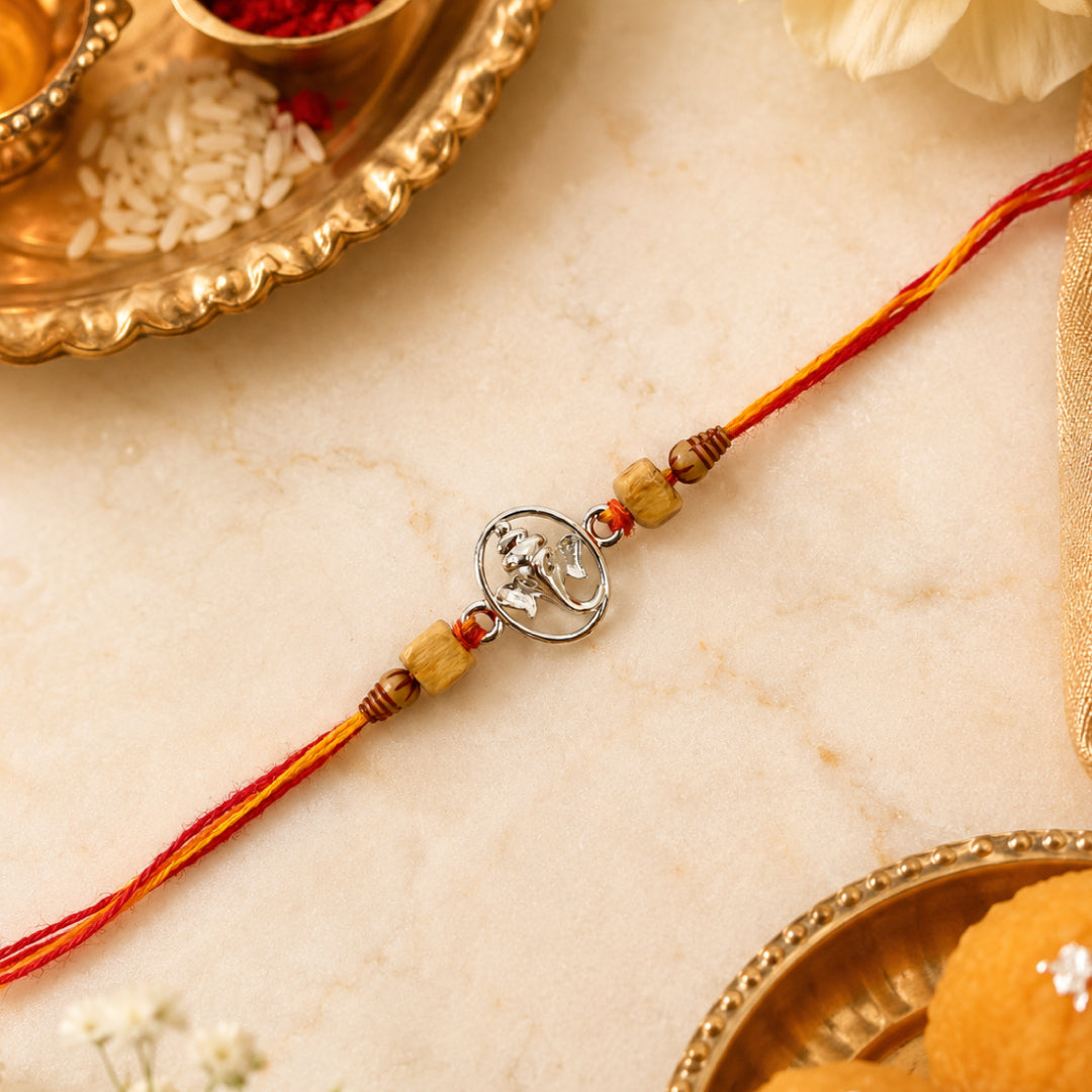 Twinklitz Premium 925 Sterling Silver Circular Ganesha Rakhi - front view