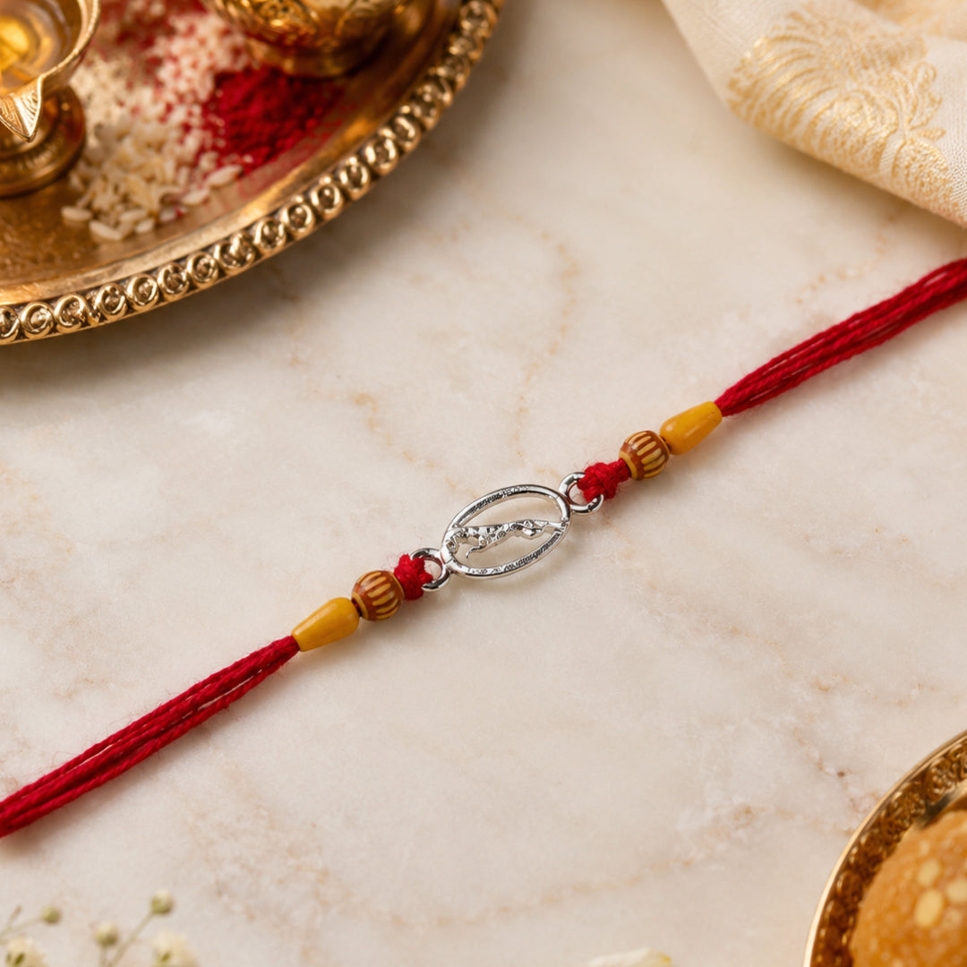 Twinklitz Jaguar Motif Sterling Silver Rakhi - front view