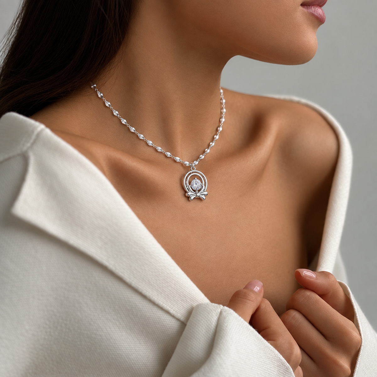Silver Bow Circle Pendant Necklace