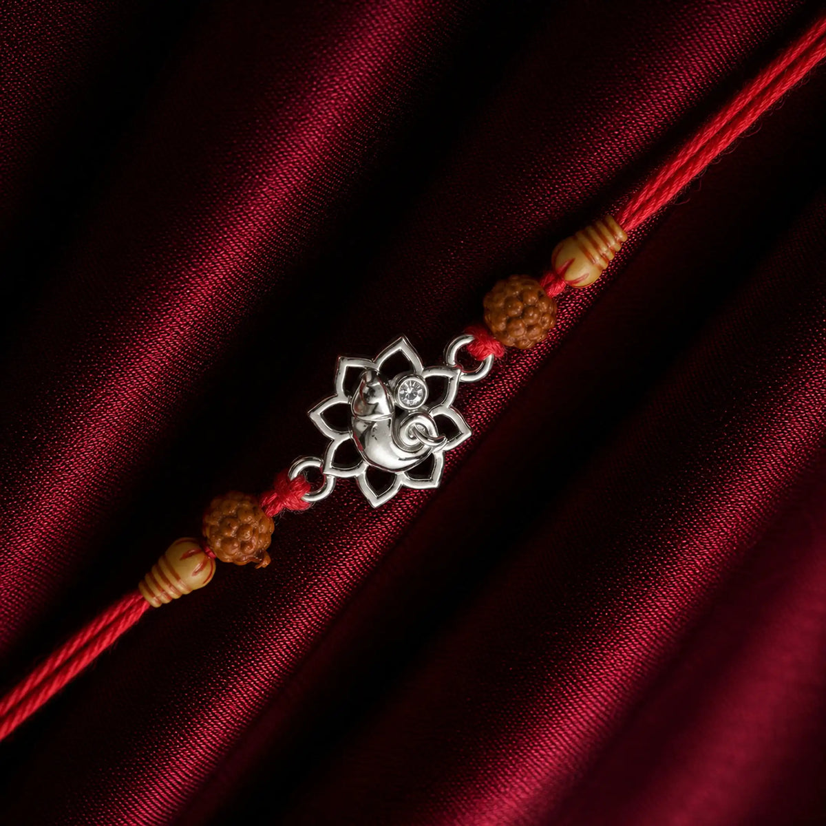 Twinklitz Lotus Ganpati Sterling Silver Rakhi