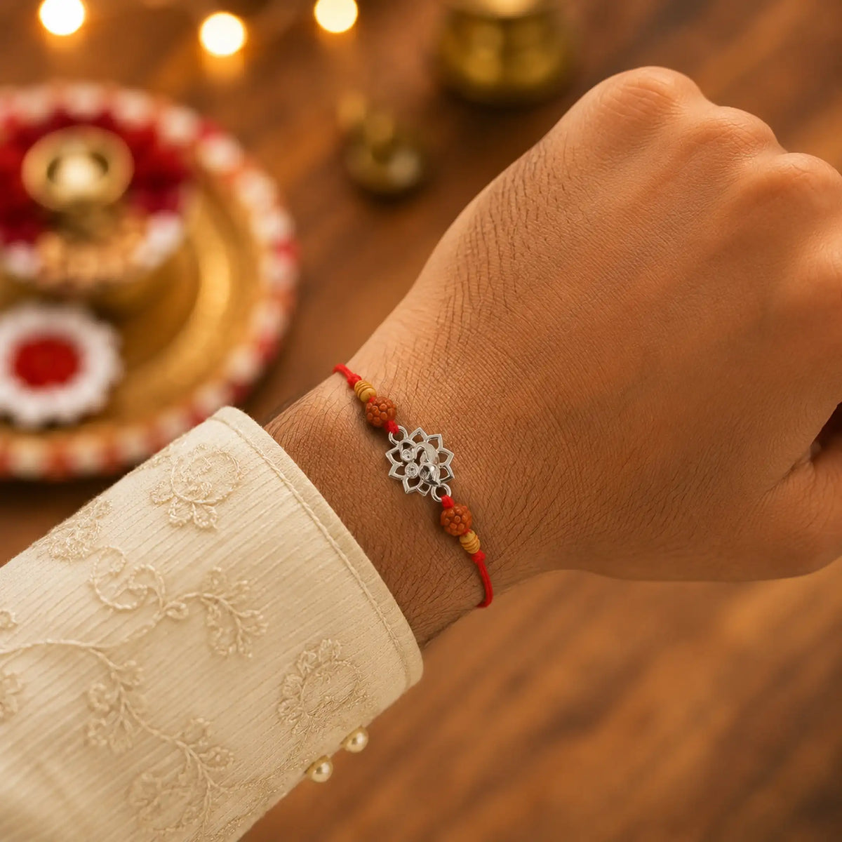 Twinklitz Lotus Ganpati Sterling Silver Rakhi