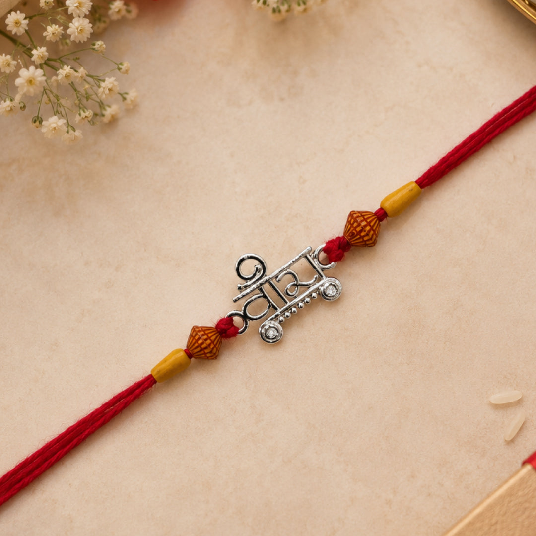 Twinklitz Traditional Veera Sterling Silver Rakhi - front view