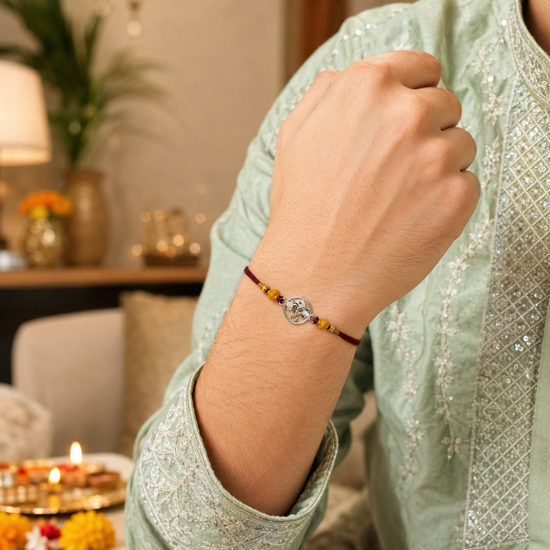 Twinklitz Ganpati 925 Sterling Silver Rakhi - close-up view