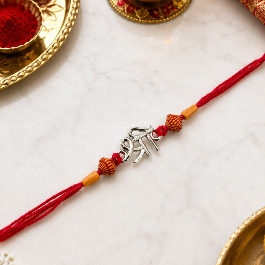 Twinklitz Shree Symbol Sterling Silver Rakhi - front view