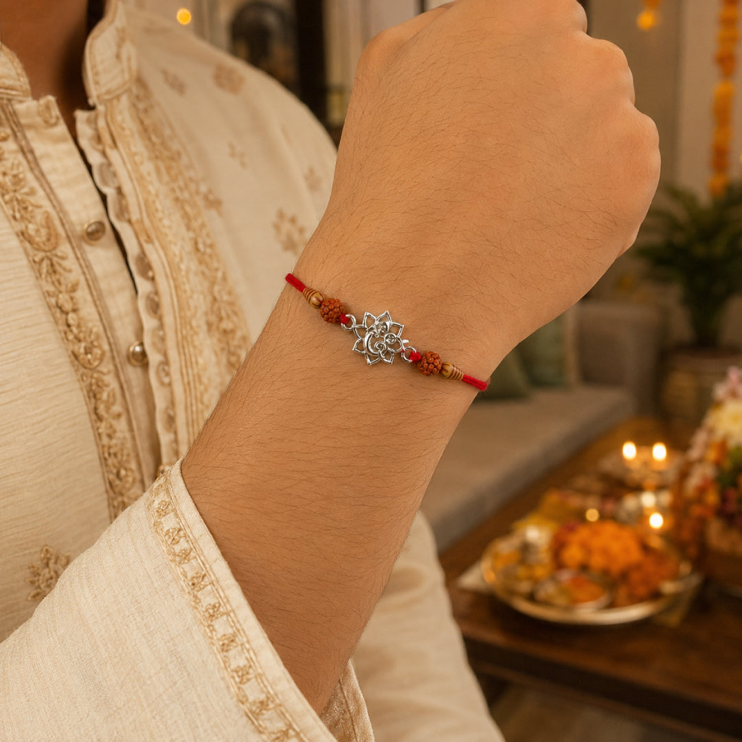 Twinklitz Lotus Ganpati Sterling Silver Rakhi - close-up view